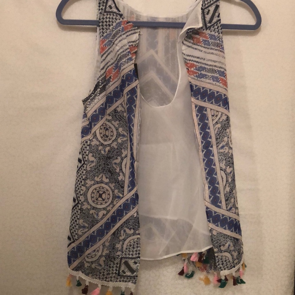Cute boho style tank with tasseled bottom